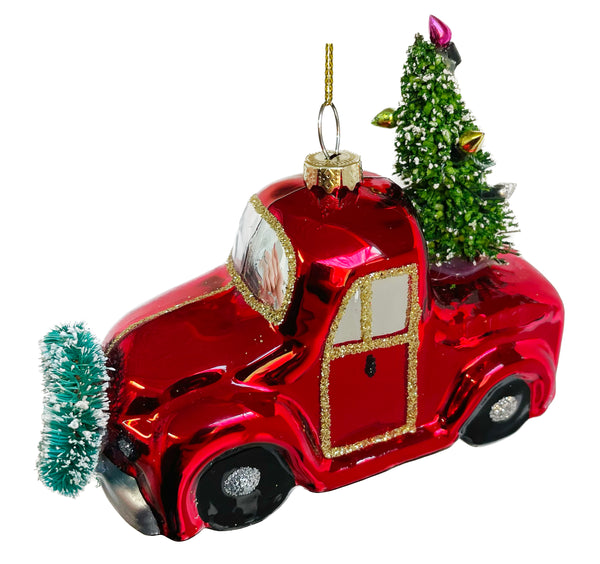 Glass car shiny red with wreath and tree